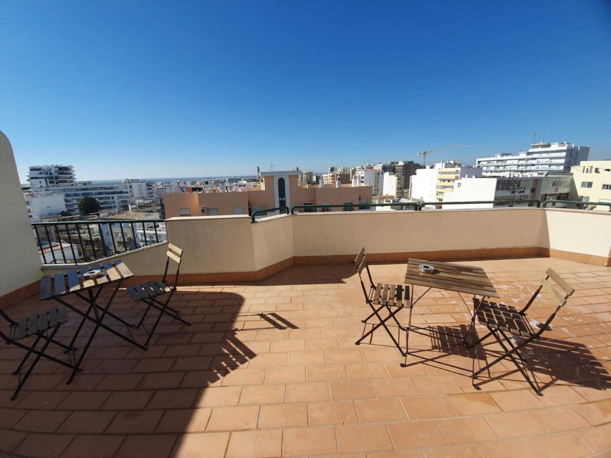 Wakeup Triplex House Hostel Faro Exterior photo